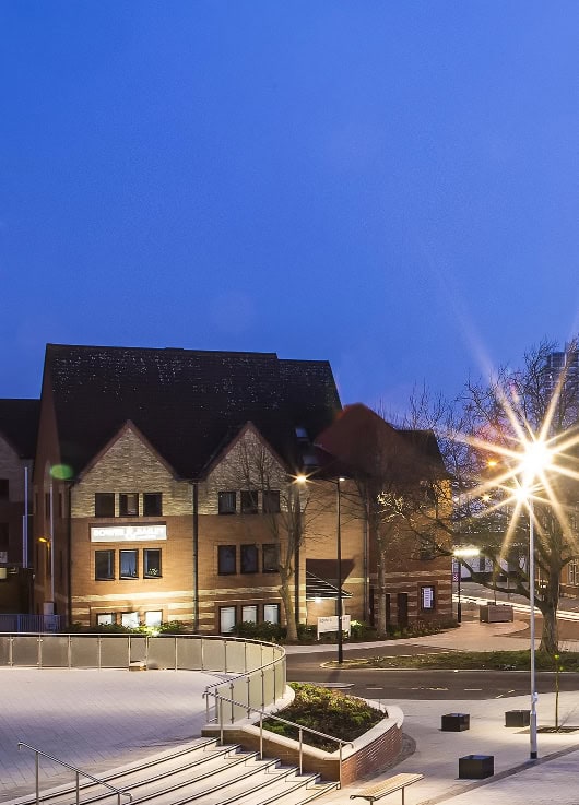 View towards College Court near Swindon Library at night